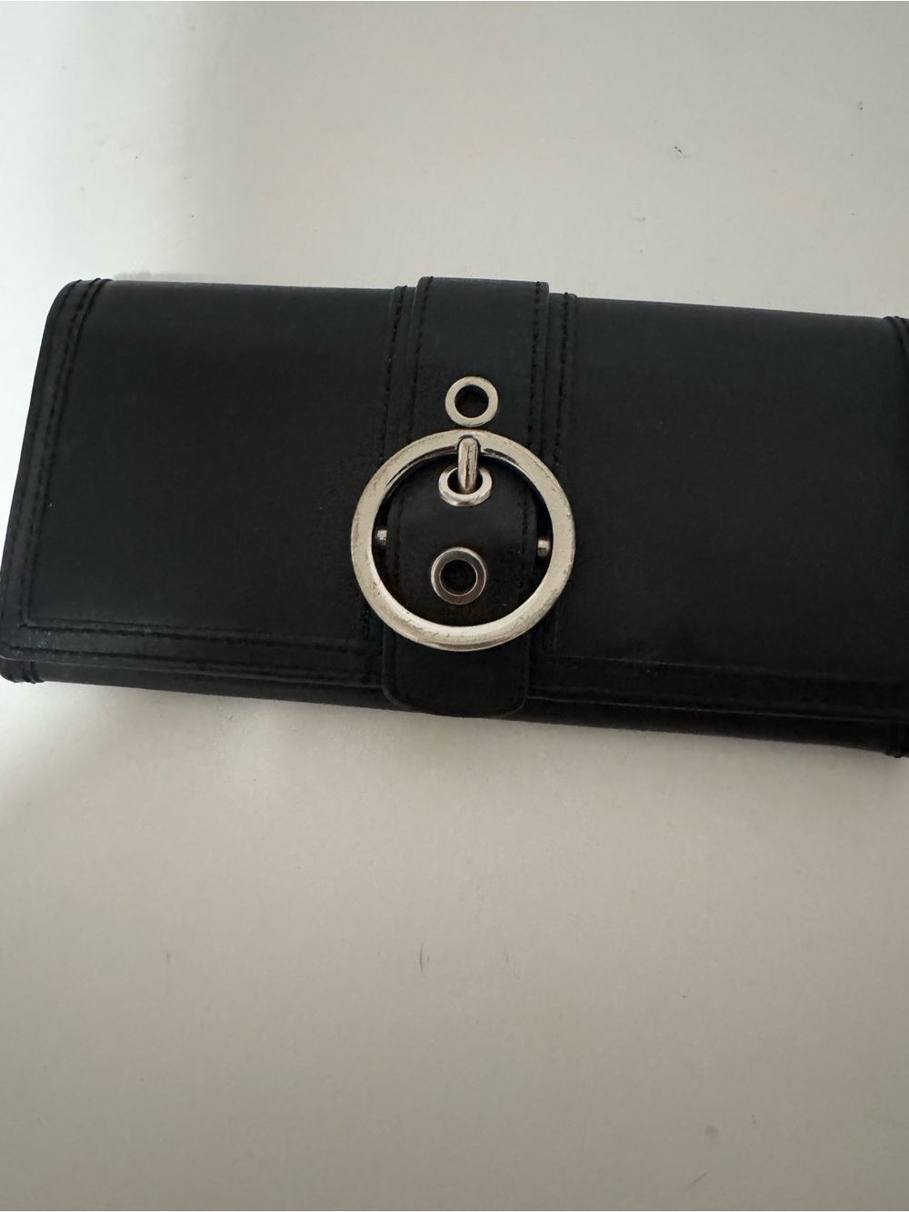 Coach Black Leather Long Flap Wallet with a Pink Interior.